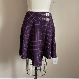 Bebe purple plaid skirt with buckles size 6